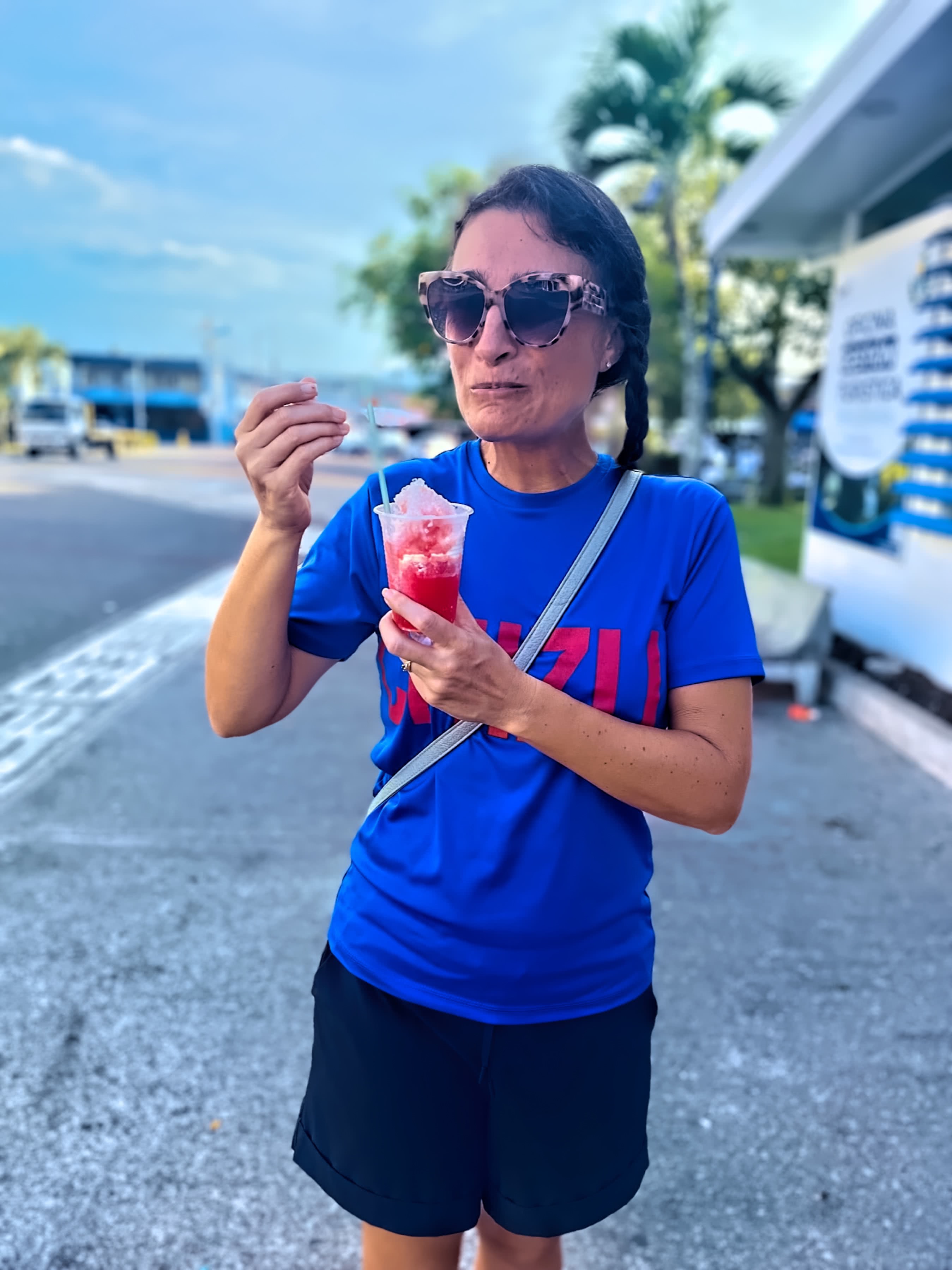 Maria enjoys a Granizado (or Copo) treat while wearing her Chizu shirt in San Isidro de El General, PZ, CR