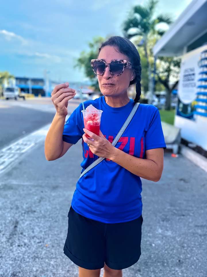 Maria enjoys a Granizado (or Copo) treat while wearing her Chizu shirt in San Isidro de El General, PZ, CR